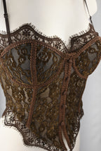 Top a corsetto con pizzo floreale