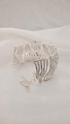 Bracciale a pannelli ondulati con cristalli