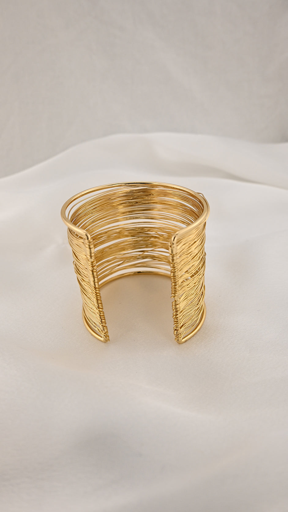 Bracciale cuff a fili multipli