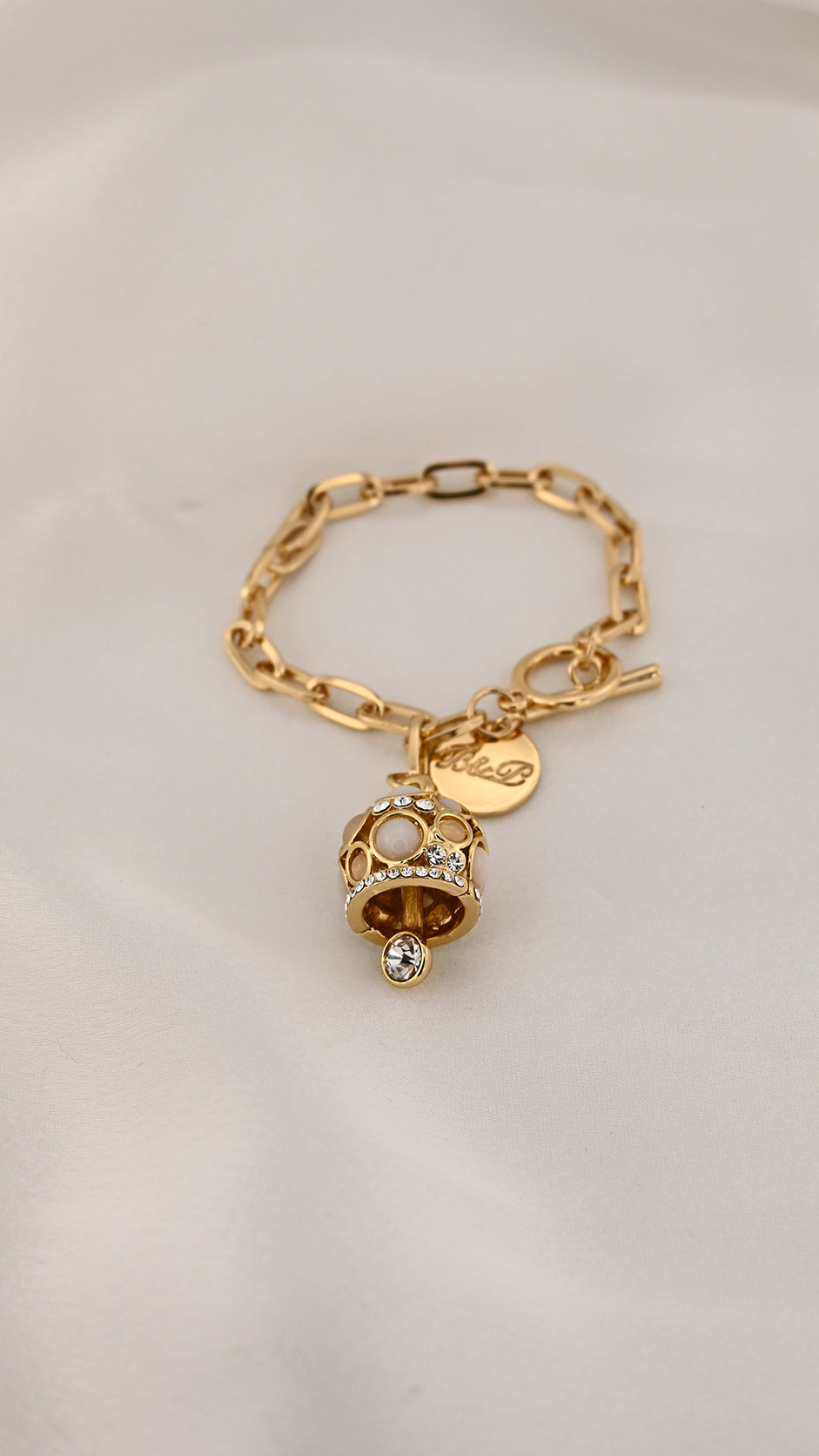 Bracciale a catena dorata con charm cupola