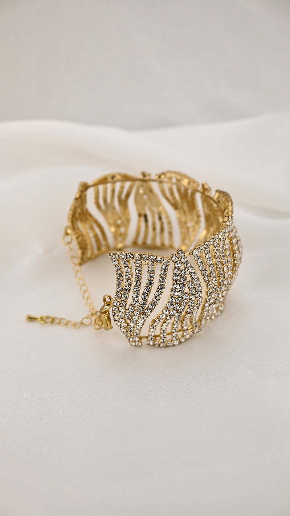 Bracciale a pannelli ondulati con cristalli