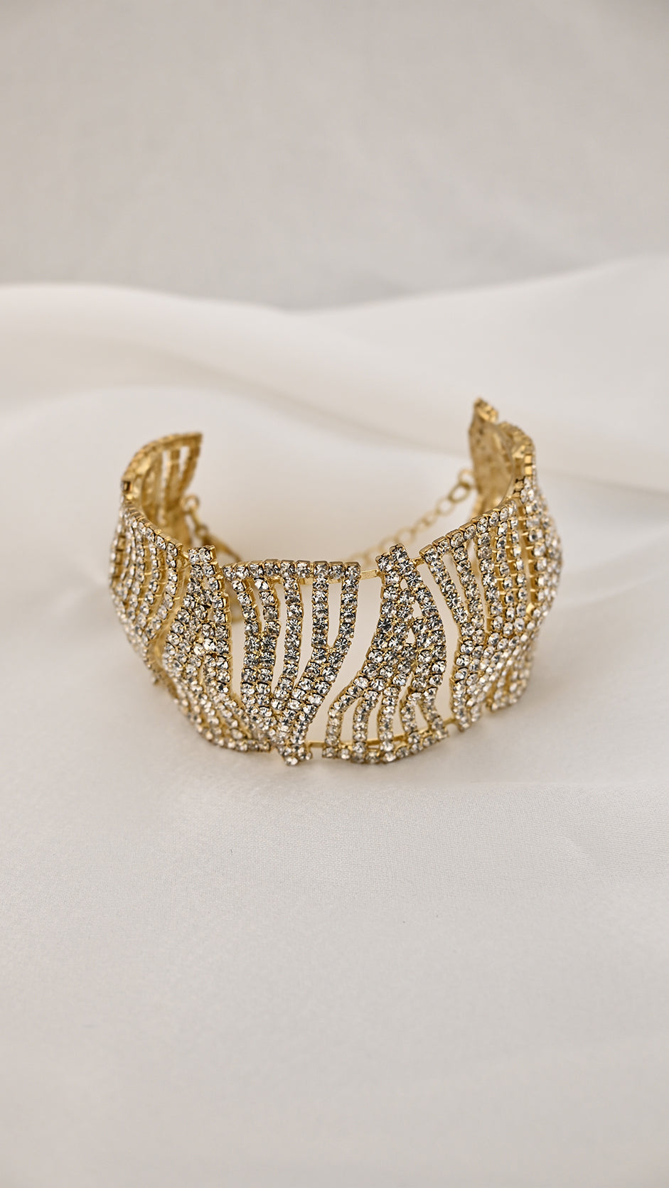 Bracciale a pannelli ondulati con cristalli