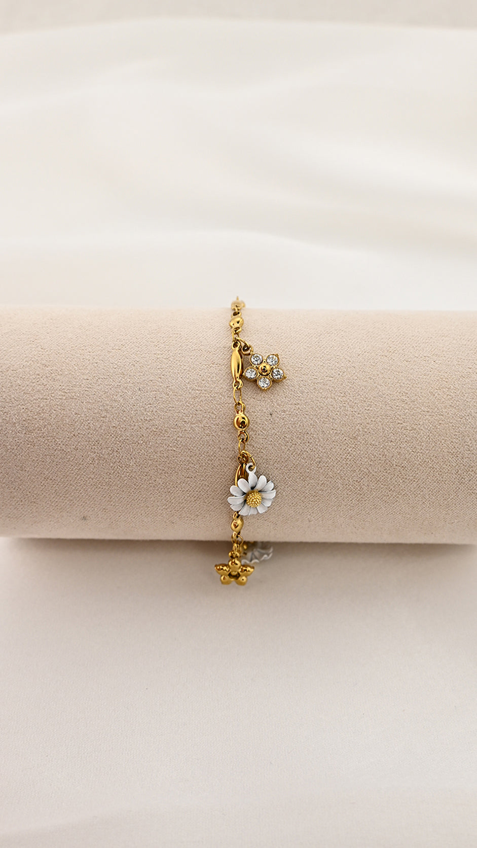 Bracciale dorato con margherita e fiori con cristalli