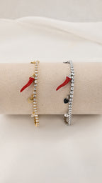 Bracciale con corno rosso e cristalli