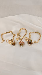 Bracciale a catena dorata con charm cupola