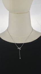 Collana con figura alata e pendente stella