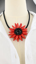 Collana con pendente floreale
