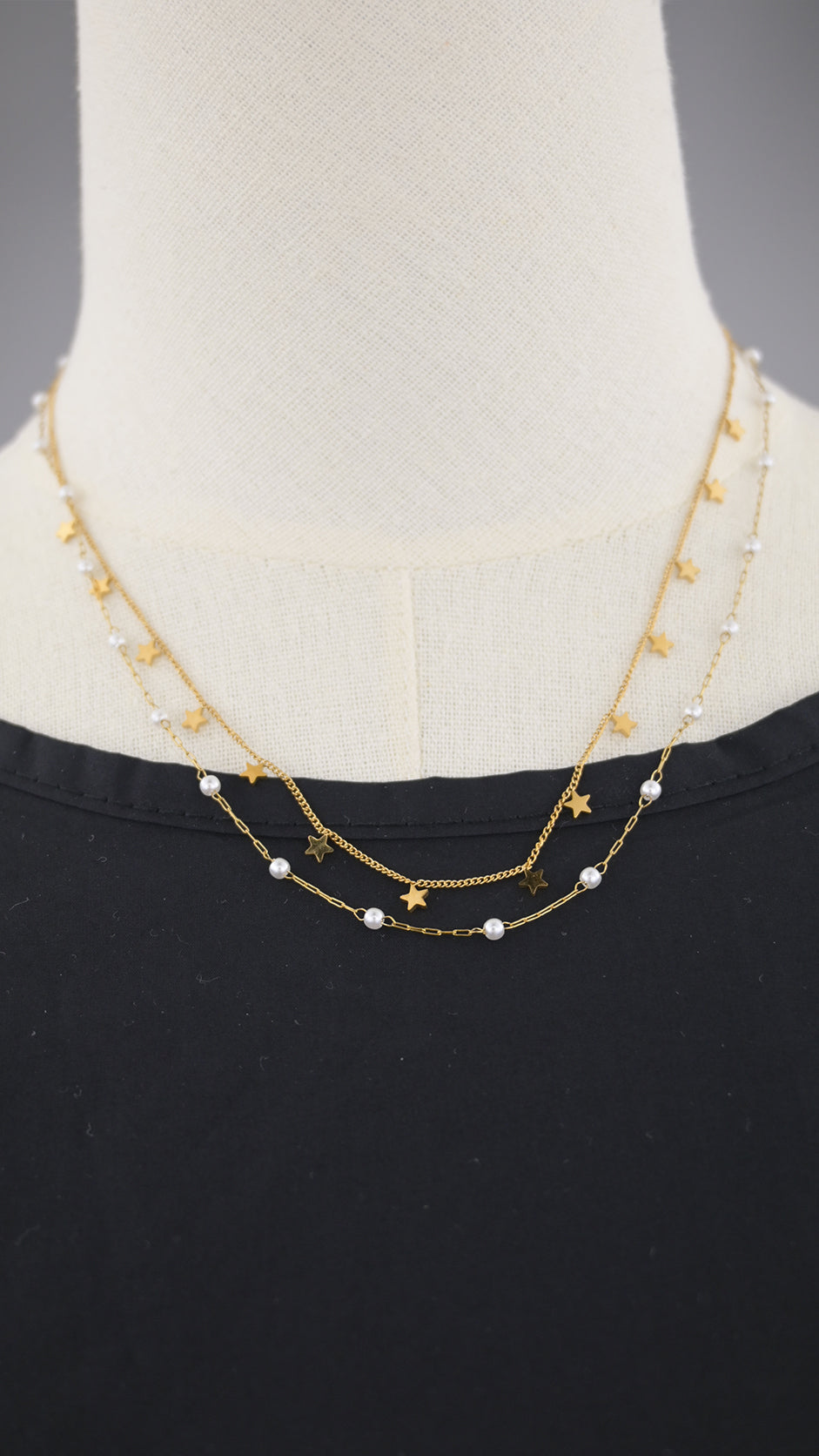 Collana doppia catena con simboli e perle