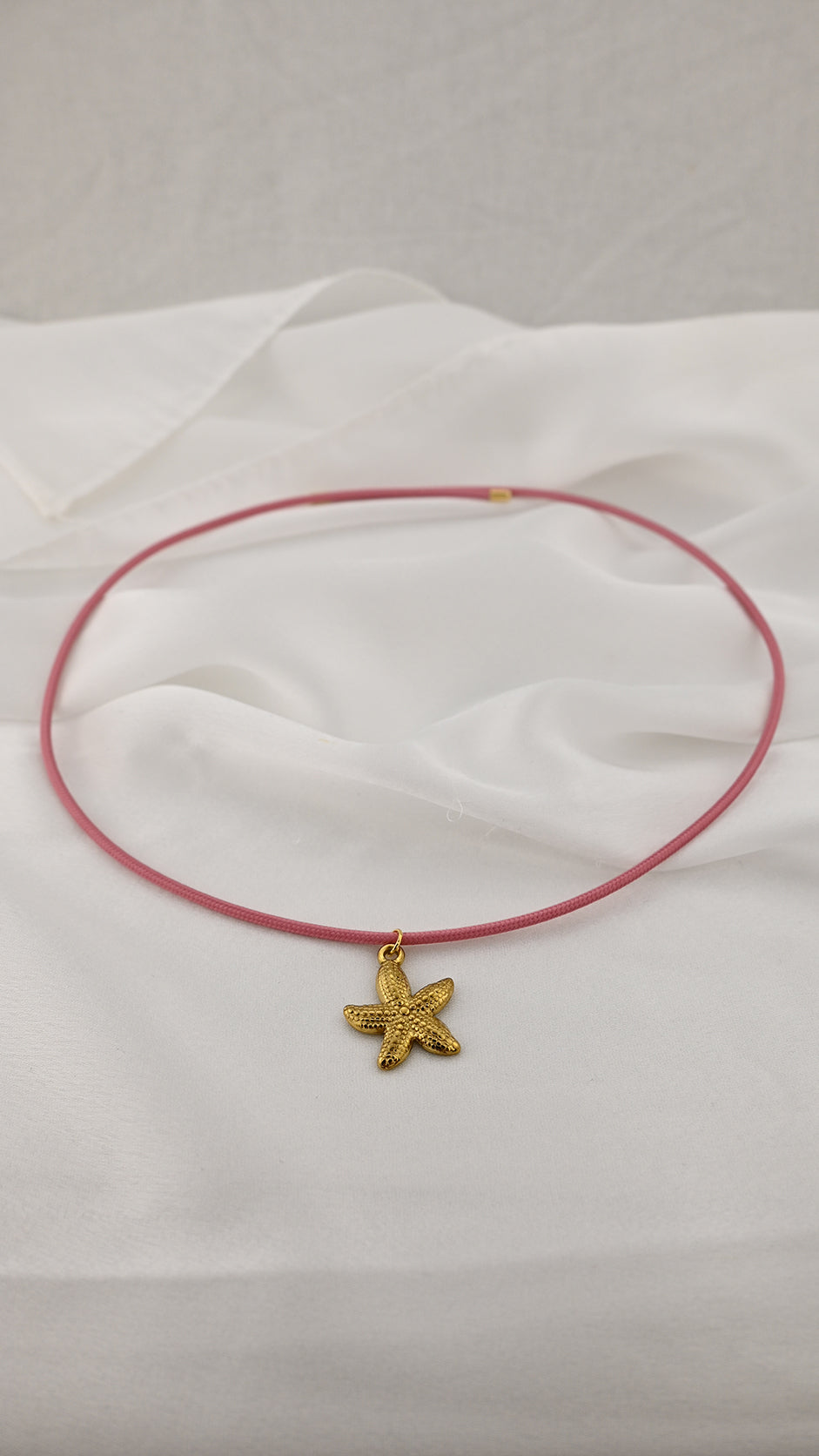 Bracciale/ Girocollo regolabile con pendente a stella marina
