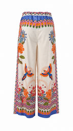 Pantaloni palazzo con stampe tropicali e dettagli animalier