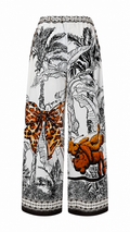 Pantaloni palazzo con stampe tropicali e dettagli animalier